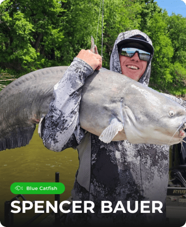 Spencer Bauer from River Certified YouTube Channel Models wearing a Hellcat Revenge® branded T-shirt in a casual outdoor setting.