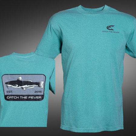 Front and back view of a cyan Catfish short sleeve lifestyle T‑shirt featuring the Catch The Fever® logo and a fish graphic with 'EST. 2015' text.