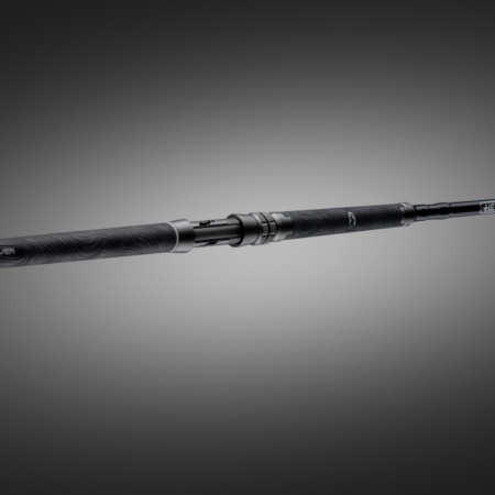 Angled full-view of the Hellcat Revenge Blackout Edition rod showing the grip, reel seat, and blank against a dark gradient background.